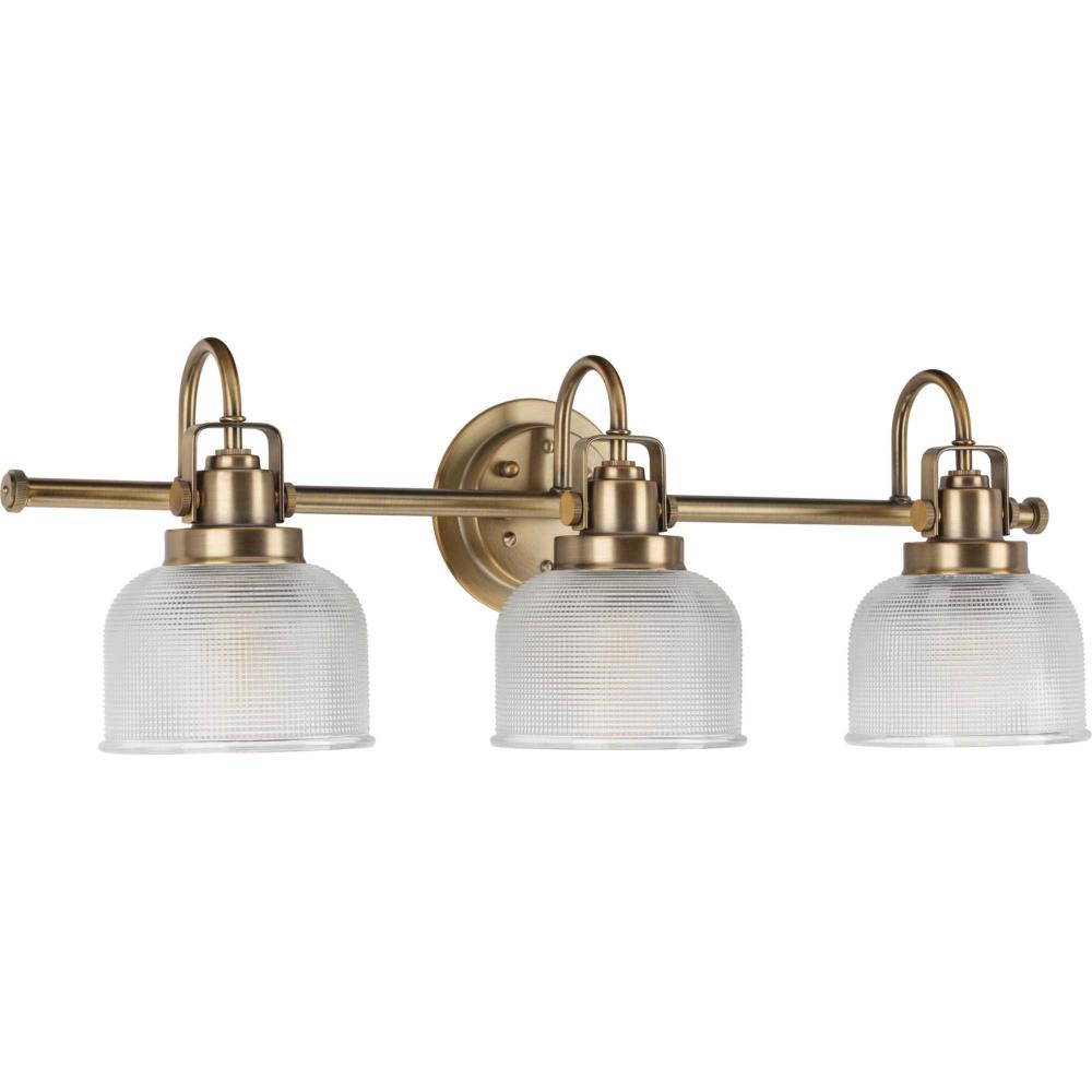Archie Collection Three-Light Vintage Brass Clear Double Prismatic Glass Coastal Bath Vanity Light